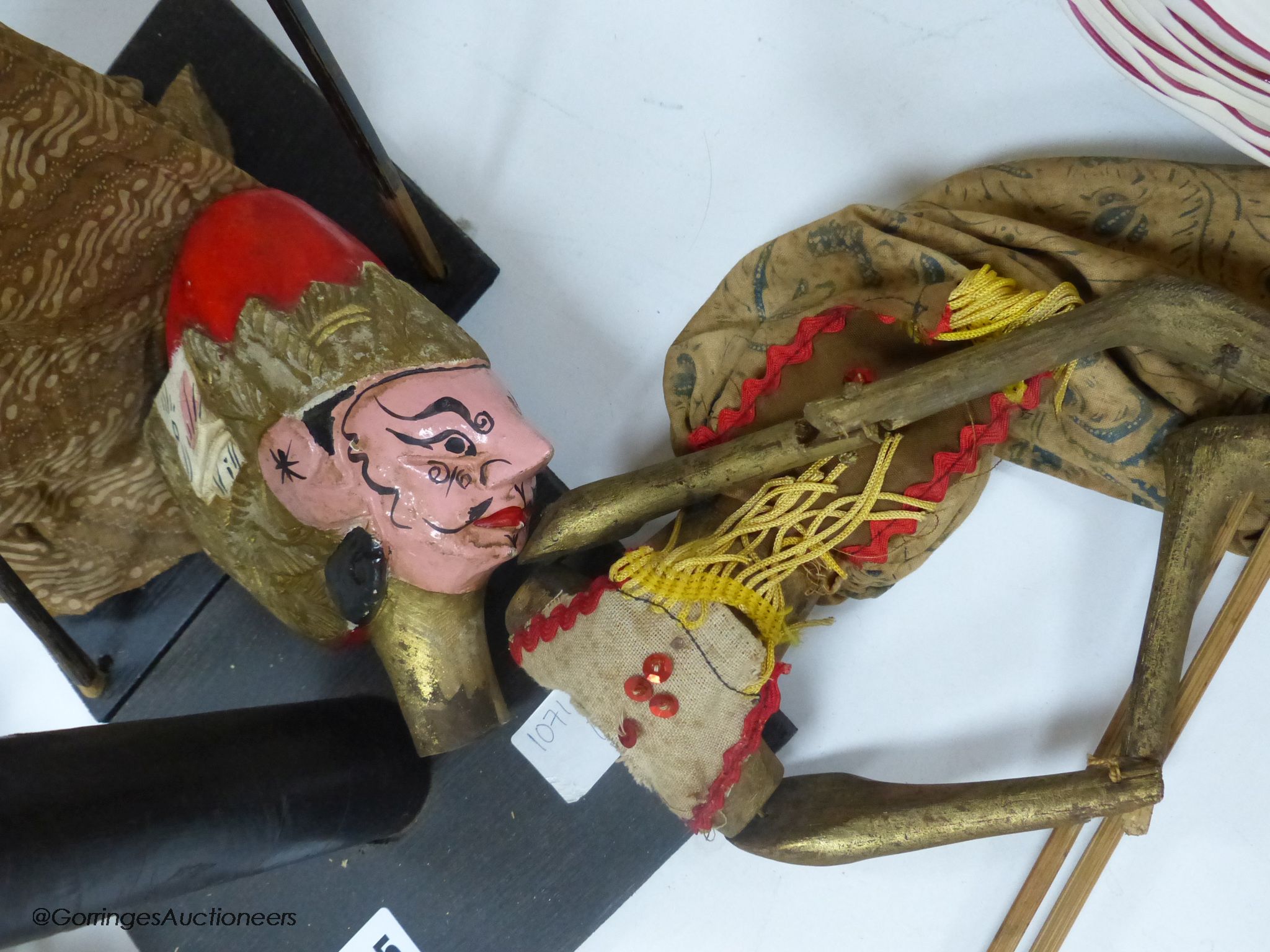 Three Indonesian stick puppets, tallest 73cm